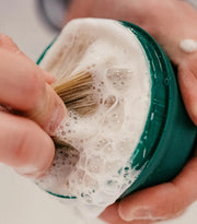 Applying Proraso shaving soap with brush
