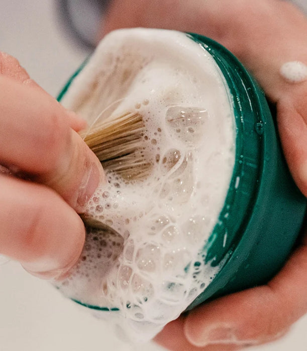 Applying Proraso shaving soap with brush